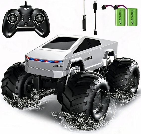 All-terrain RC Cyber Truck on rugged terrain with mountainous backdrop.